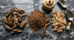 Types of bukhoor - agarwood chips, Mabsoos powder, and natural resins used in traditional Arabic incense Dubai